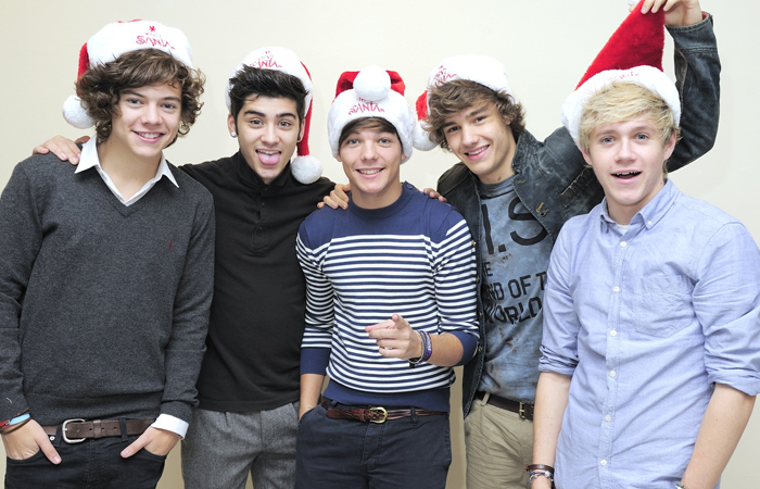 Celebrities wearing santa hats