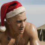 Celebrities wearing santa hats